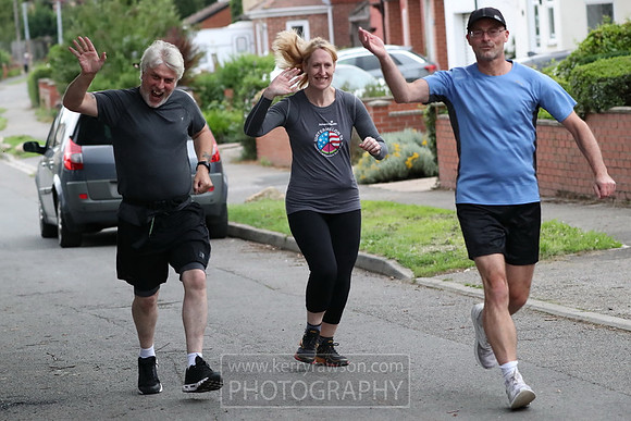 Wave at your daft photographer guys