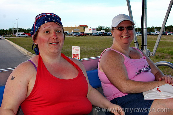 Emma and Laurali, happy to be riding back to the car after a long day...