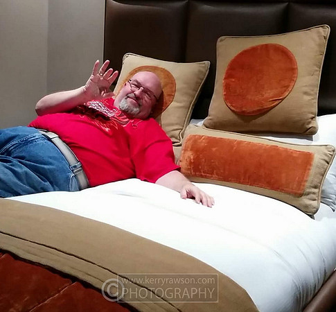 Mark's happy with our first room of the holiday