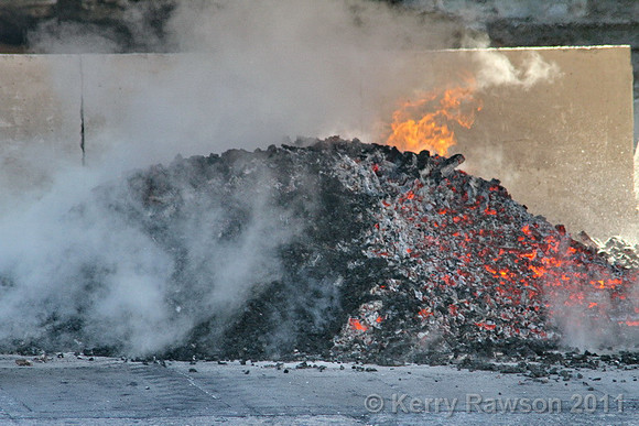Preparing the charcoal ready to distil the whisky through