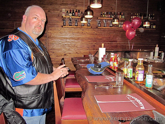 Mark looks impressed by the seats at the Chef's bar