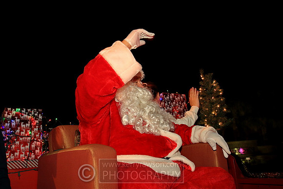 Santa waves at everyone
