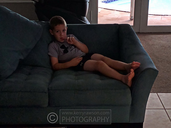 Trent chills on the sofa