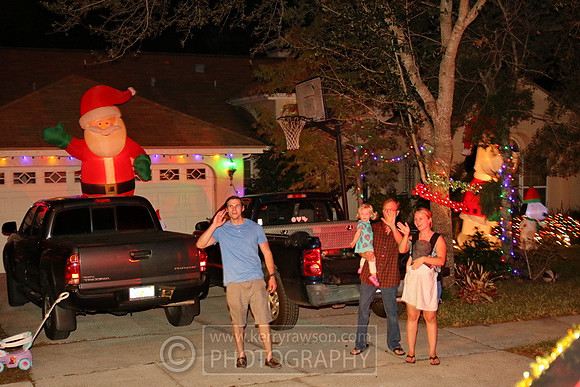 Families coming out to see Santa pass by